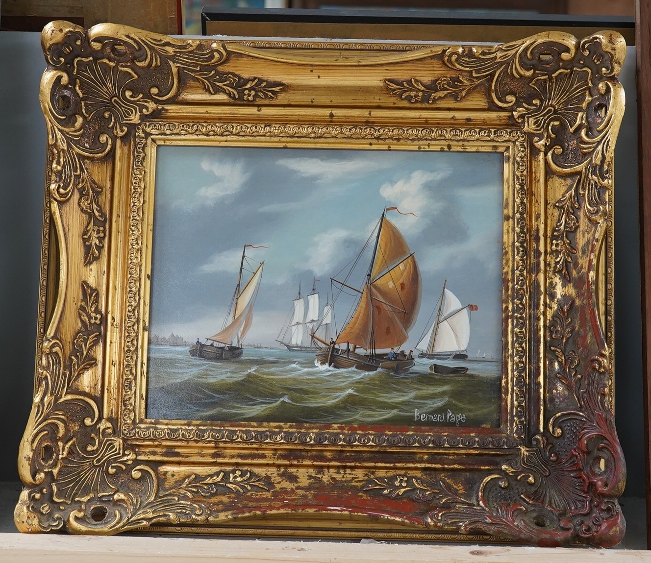 Bernard Page (1927-1988), Contemporary oil on board, Seascape with sailing boats, signed, 19 x 24cm, ornate gilt framed. Condition - good